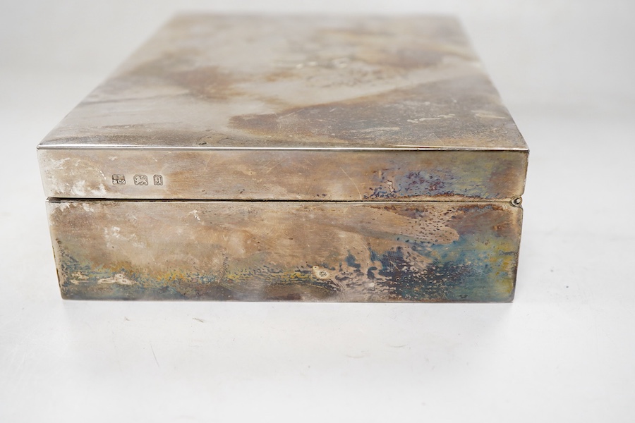 A George V silver mounted rectangular cigarette box, Sampson Mordan & Co, London, 1931, 17cm, with engraved monogram to the cover.